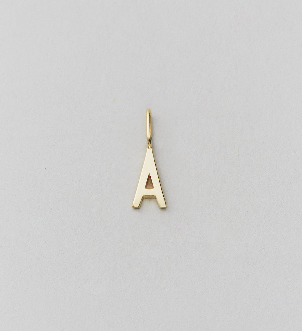 Zlatý přívěsek Písmeno A-Z - 10 mm DESIGN LETTERS - Lavly