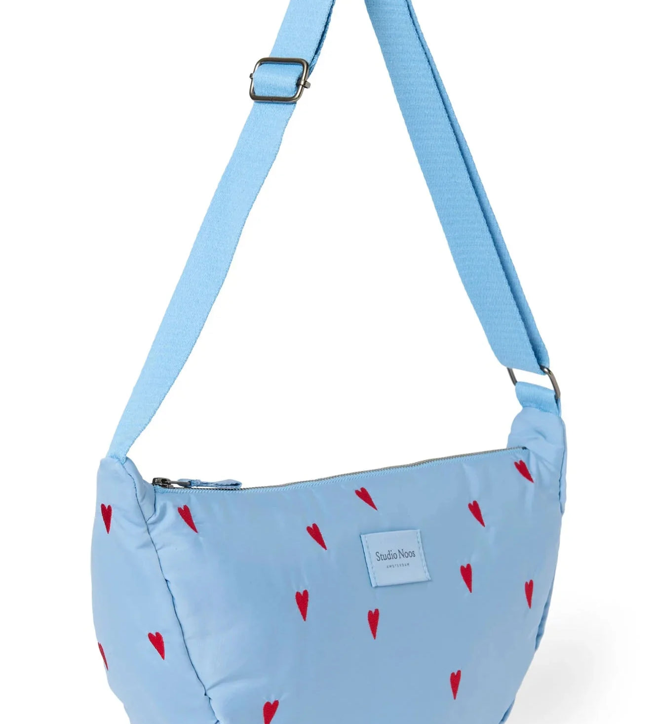 Crossbody ledvinka STUDIO NOOS Light Blue Hearts Puffy | Lavly.cz
