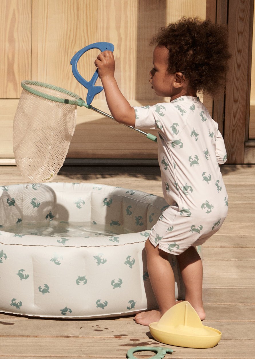 Plavkový overal SPF40 LIEWOOD Max Crab / Sandy | Stylové doplňky pro děti a ženy | Lavly.cz