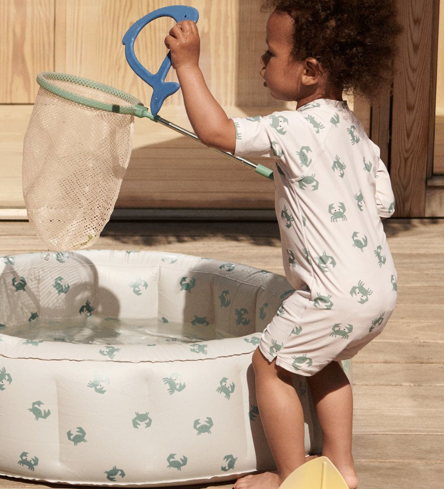 Plavkový overal SPF40 LIEWOOD Max Crab / Sandy | Stylové doplňky pro děti a ženy | Lavly.cz