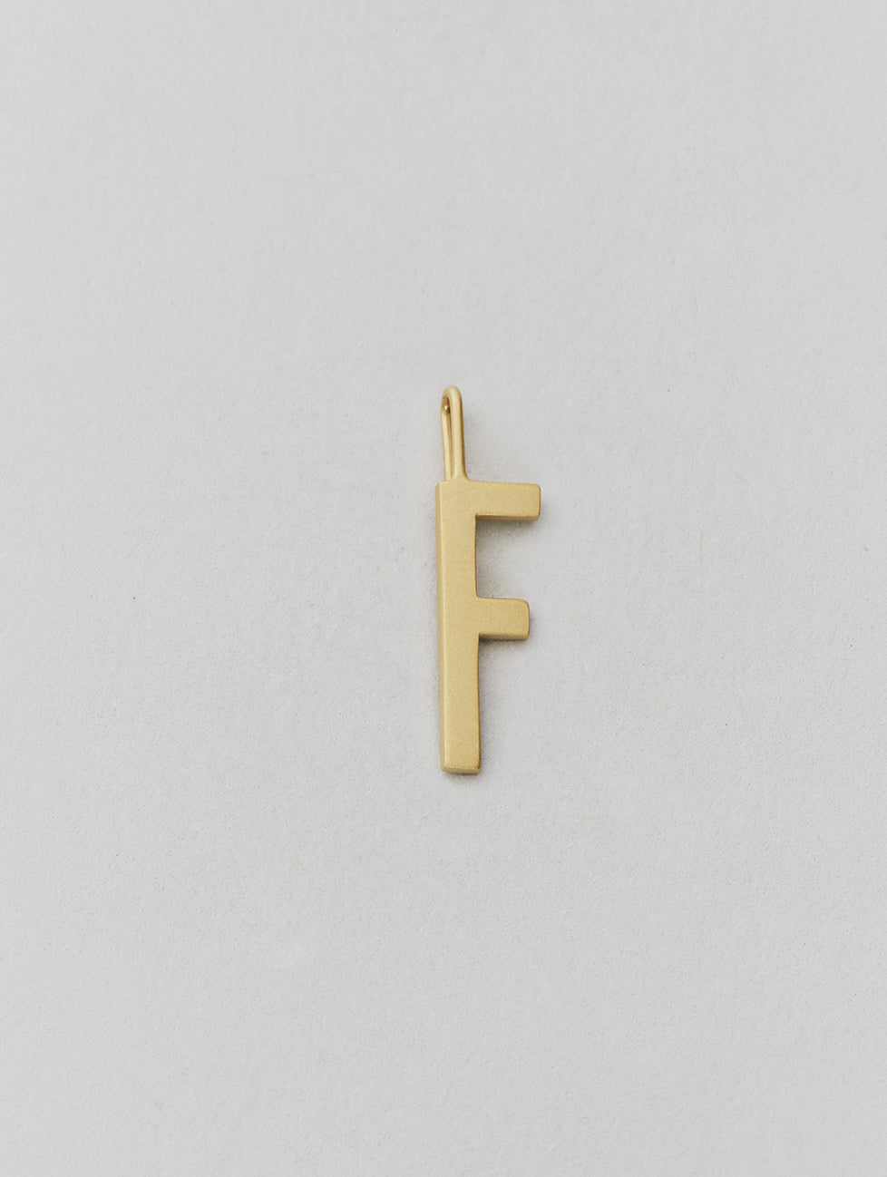 Zlatý přívěsek Písmeno A - Z - 16 mm DESIGN LETTERS | Stylové doplňky pro děti a ženy | Lavly.cz